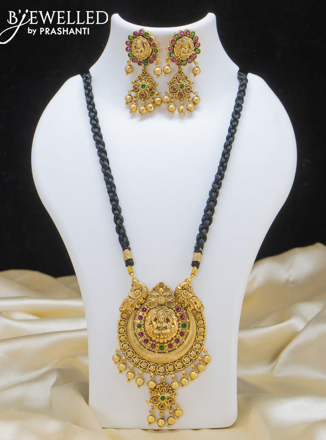 Black thread necklace with lakshmi pendant and golden beads hangings