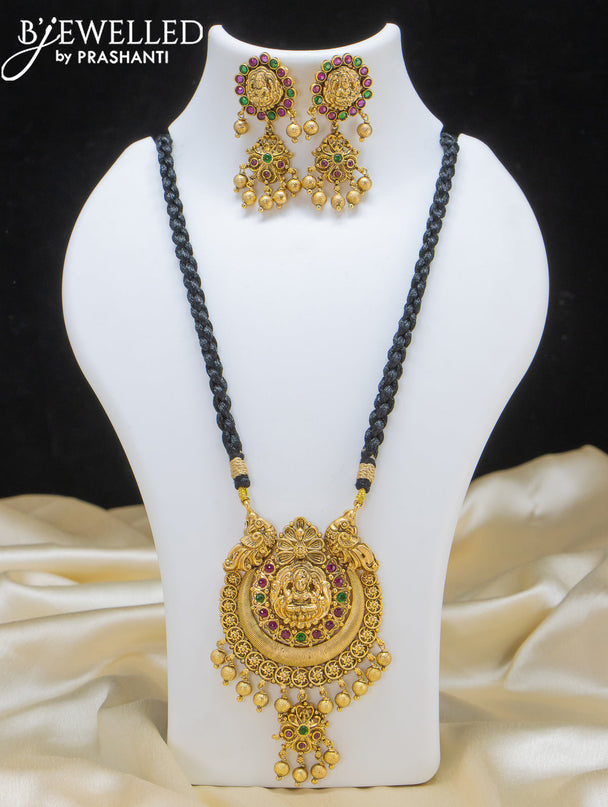 Black thread necklace with lakshmi pendant and golden beads hangings