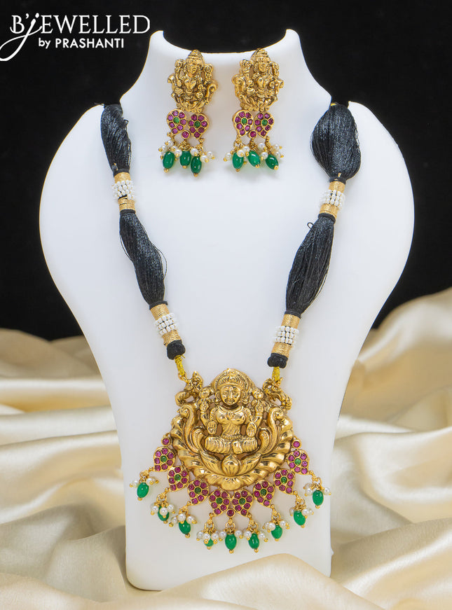 Black thread necklace with lakshmi pendant and green beads hangings