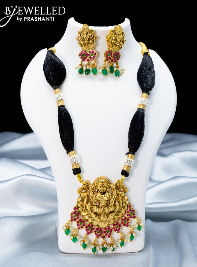Black thread necklace with kemp stone and lakshmi pendant