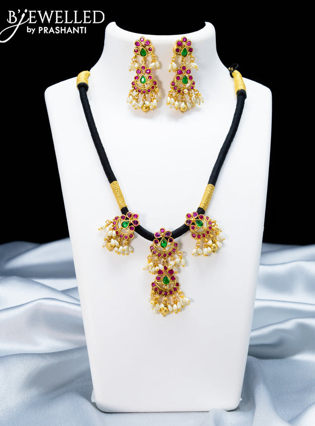 Black thread necklace with kemp stone and pearl hangings