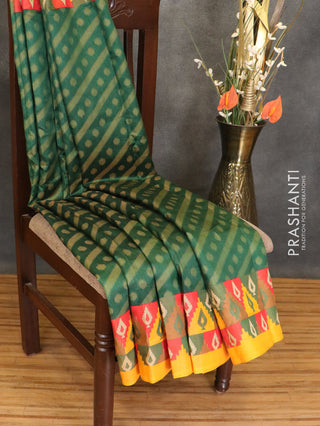 Brasso saree green and yellow with allover weaves and woven border