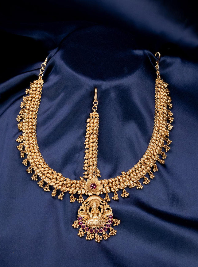 Antique gutta pusalu lakshmi design maang tikka with pink kemp stone - {{ collection.title }} by Prashanti Sarees