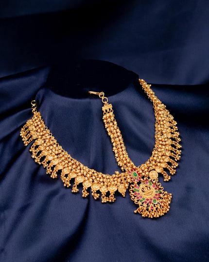 Antique lakshmi design maang tikka with kemp stone and golden beads hanging - {{ collection.title }} by Prashanti Sarees