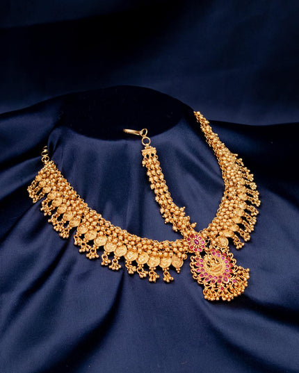 Antique lakshmi design maang tikka with pink kemp stone and golden beads hanging - {{ collection.title }} by Prashanti Sarees