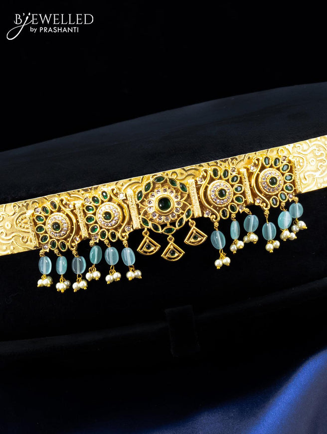 Antique self emboss design hip belt with green kemp stones and ice blue beads hanging - {{ collection.title }} by Prashanti Sarees