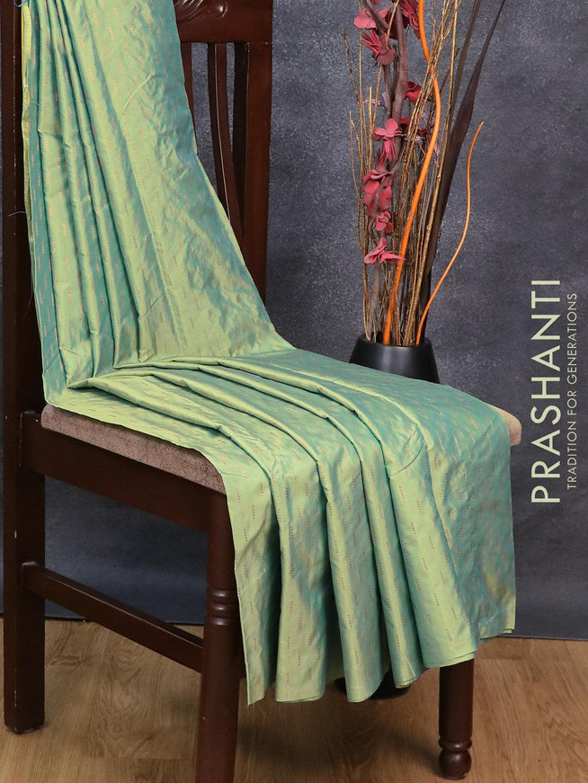 Arani semi silk saree dual shade of teal green and yellow with copper zari woven butta weaves in borderless style - {{ collection.title }} by Prashanti Sarees