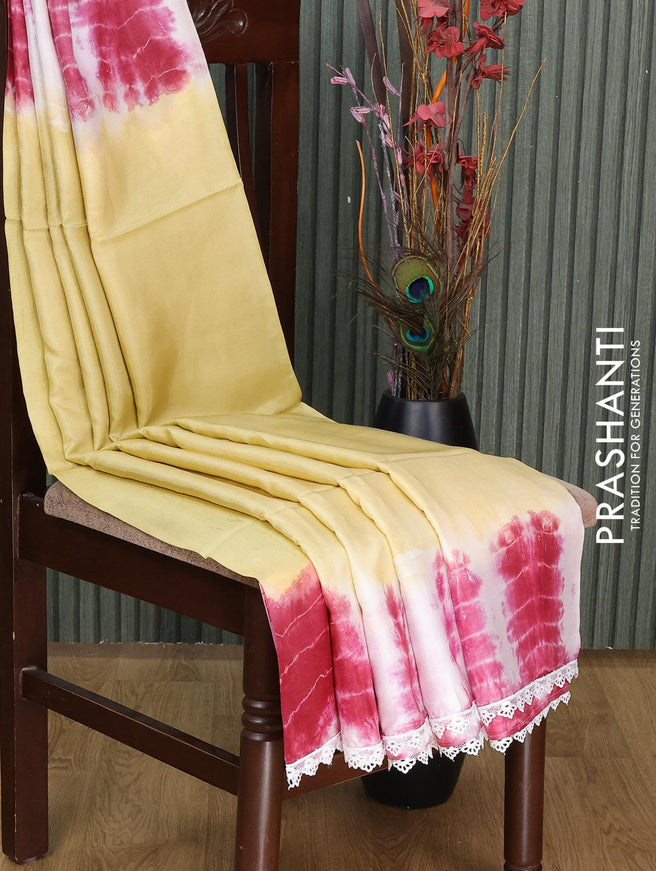 Banana silk saree pale yellow and maroon with tie & dye batik butta prints and corcia lace border - {{ collection.title }} by Prashanti Sarees