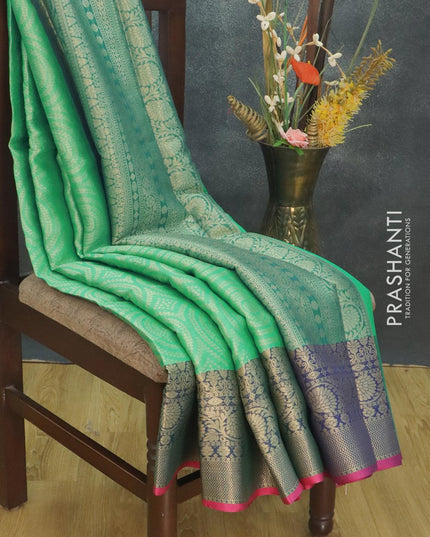 Banarasi kora saree teal green and blue with allover zari weaves and floral zari woven border - {{ collection.title }} by Prashanti Sarees