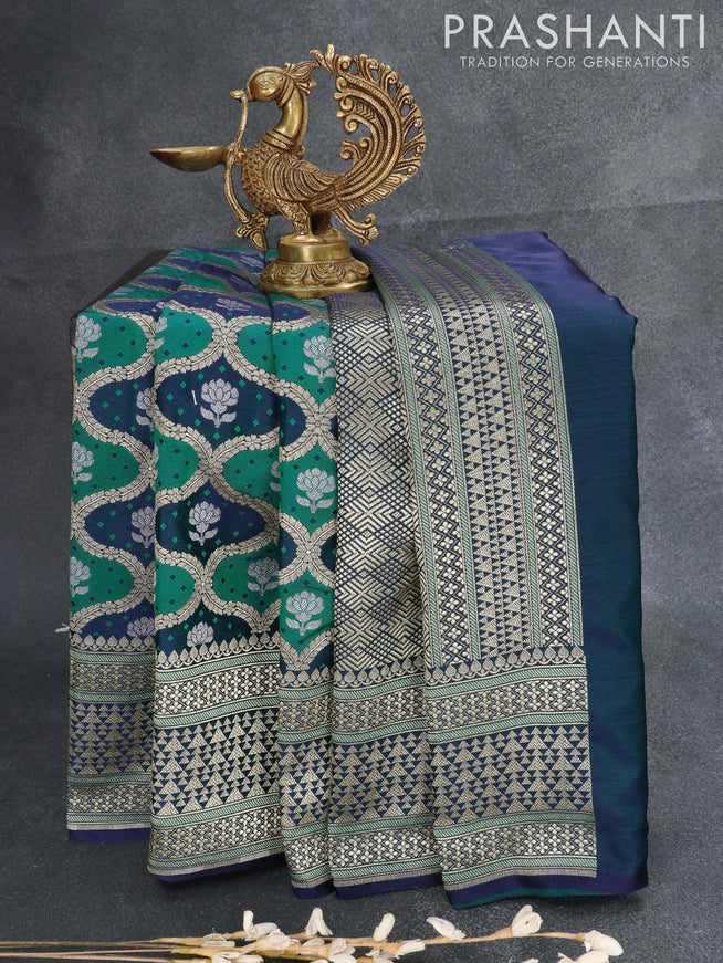 Banarasi satin silk saree navy blue and green shade with allover self emboss & zari weaves and zari woven border - {{ collection.title }} by Prashanti Sarees