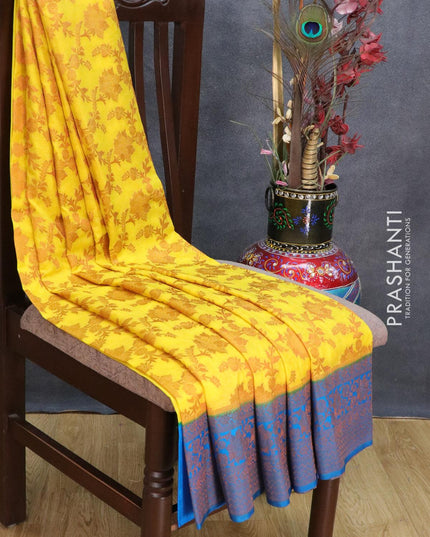Banarasi semi crepe saree yellow and cs blue with allover copper zari floral weaves and floral copper zari woven border - {{ collection.title }} by Prashanti Sarees