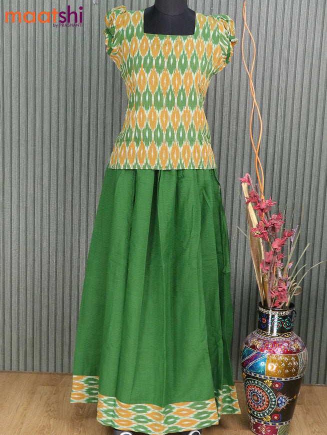 Cotton kids lehanga green with allover ikat butta weaves and back knot & simple border for 15 years - {{ collection.title }} by Prashanti Sarees