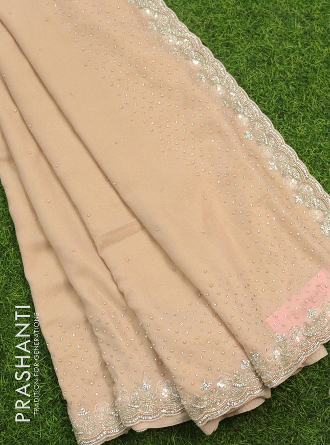 Designer georgette saree pastel peach with allover stone & zardosi work - {{ collection.title }} by Prashanti Sarees