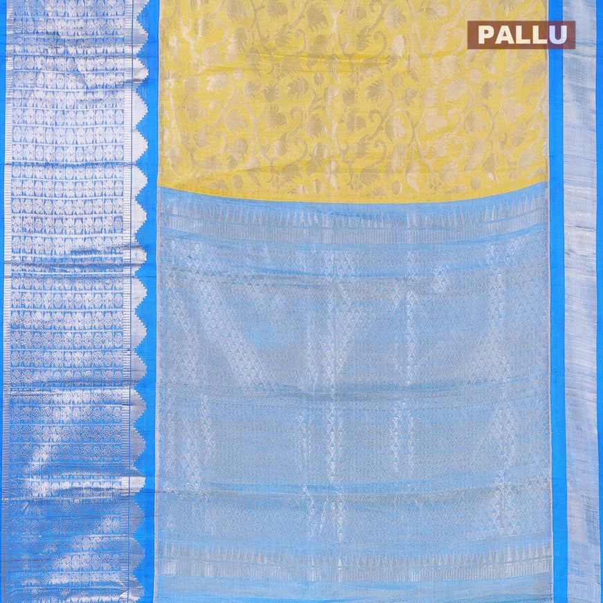 Kuppadam tissue silk cotton saree lime green and cs blue with allover silver zari woven brocade weaves and long temple design silver zari checked border - {{ collection.title }} by Prashanti Sarees