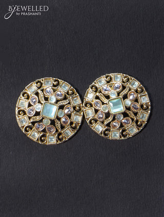Light weight earrings with cz and mint green stone