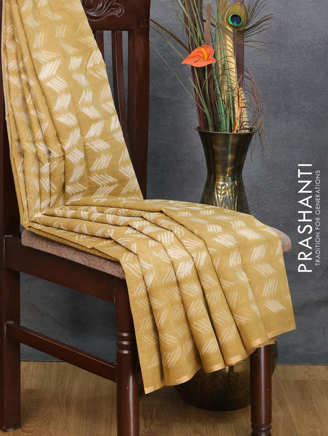 Maheshwari silk cotton saree khaki shade with allover butta prints and zari woven piping border - {{ collection.title }} by Prashanti Sarees