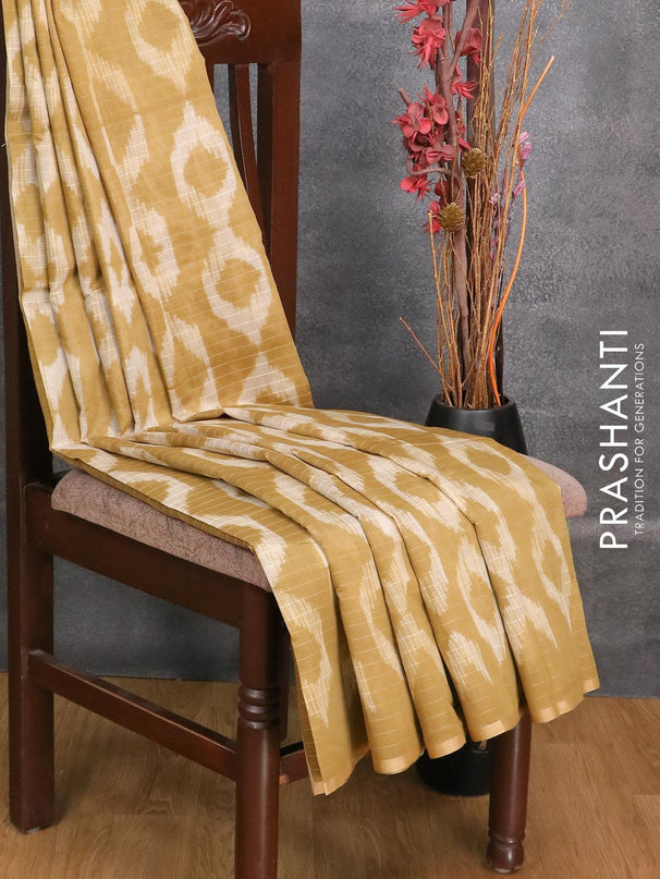 Maheshwari silk cotton saree khaki shade with allover geometric prints and zari woven piping border - {{ collection.title }} by Prashanti Sarees