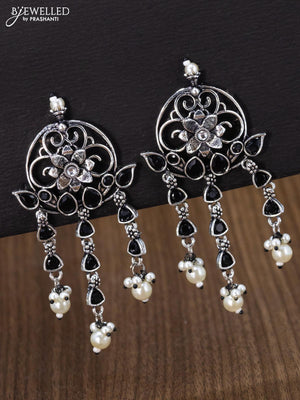Oxidised earring floral design with black stone and pearl hangings