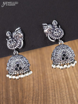 Oxidised jhumka lakshmi design with black stones and pearl hangings