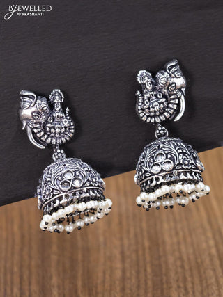 Oxidised jhumka lakshmi design with cz stones and pearl hangings