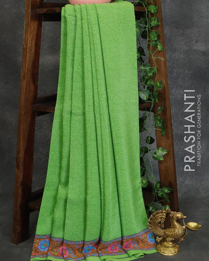 Printed crepe silk saree light green and orange with allover prints and printed border - {{ collection.title }} by Prashanti Sarees