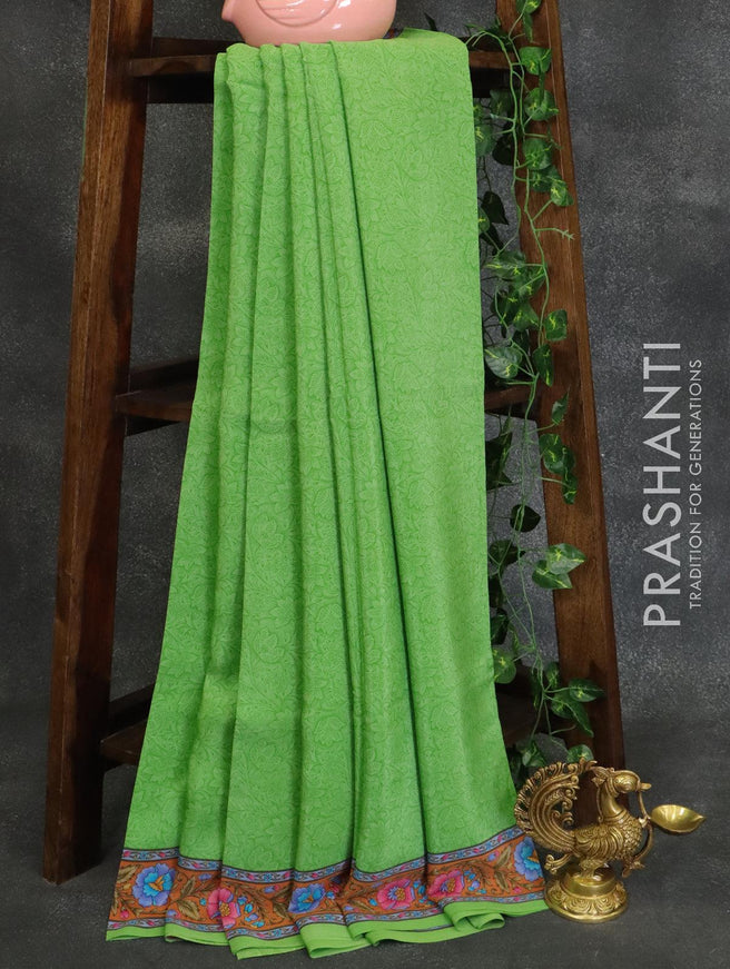 Printed crepe silk saree light green and orange with allover prints and printed border - {{ collection.title }} by Prashanti Sarees