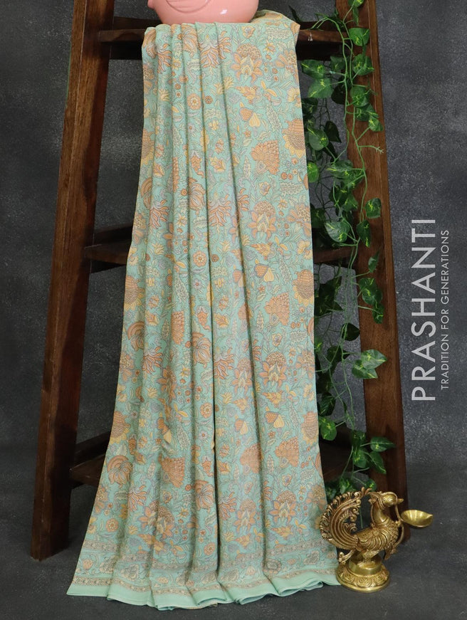 Printed crepe silk saree pastel green with allover prints and printed border - {{ collection.title }} by Prashanti Sarees