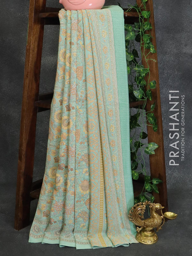 Printed crepe silk saree pastel green with allover prints and printed border - {{ collection.title }} by Prashanti Sarees