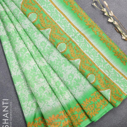 Printed silk saree off white and green shade with allover prints and printed border - {{ collection.title }} by Prashanti Sarees