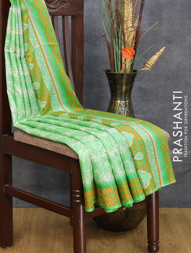 Printed silk saree off white and green shade with allover prints and printed border - {{ collection.title }} by Prashanti Sarees