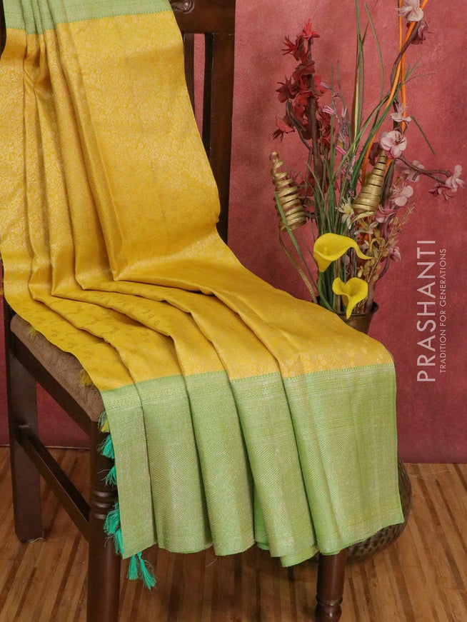 Pure Kanchivaram silk saree yellow and light green with allover floral zari weaves and zari woven border - {{ collection.title }} by Prashanti Sarees