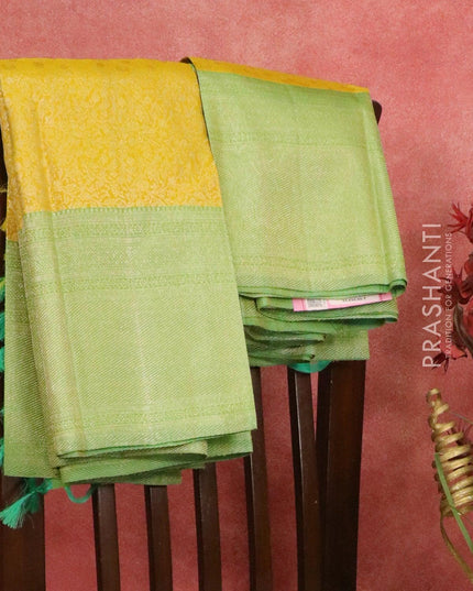 Pure Kanchivaram silk saree yellow and light green with allover floral zari weaves and zari woven border - {{ collection.title }} by Prashanti Sarees