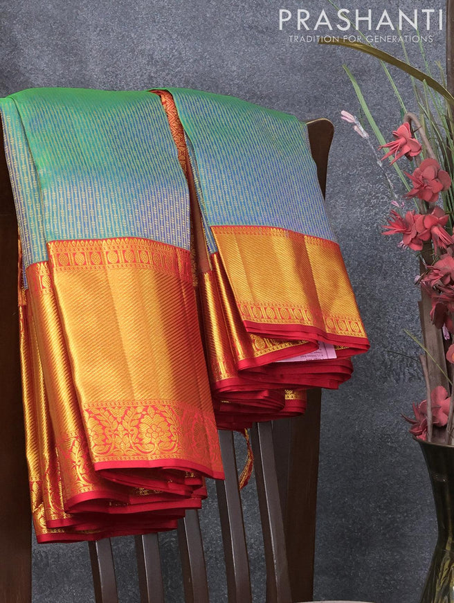 Pure kanjivaram silk saree dual shade of bluish green and red with allover zari weaves and long rich floral design zari woven border - {{ collection.title }} by Prashanti Sarees