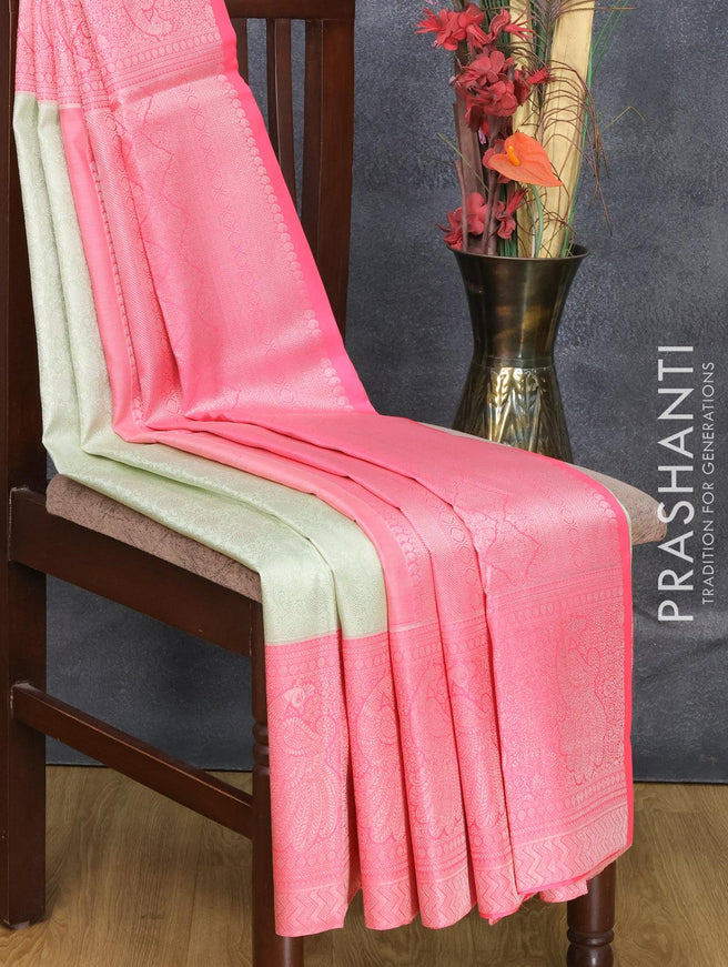 Pure kanjivaram silk saree pista green and light pink with allover silver woven floral design weaves and rich silver zari woven peacock design border - {{ collection.title }} by Prashanti Sarees
