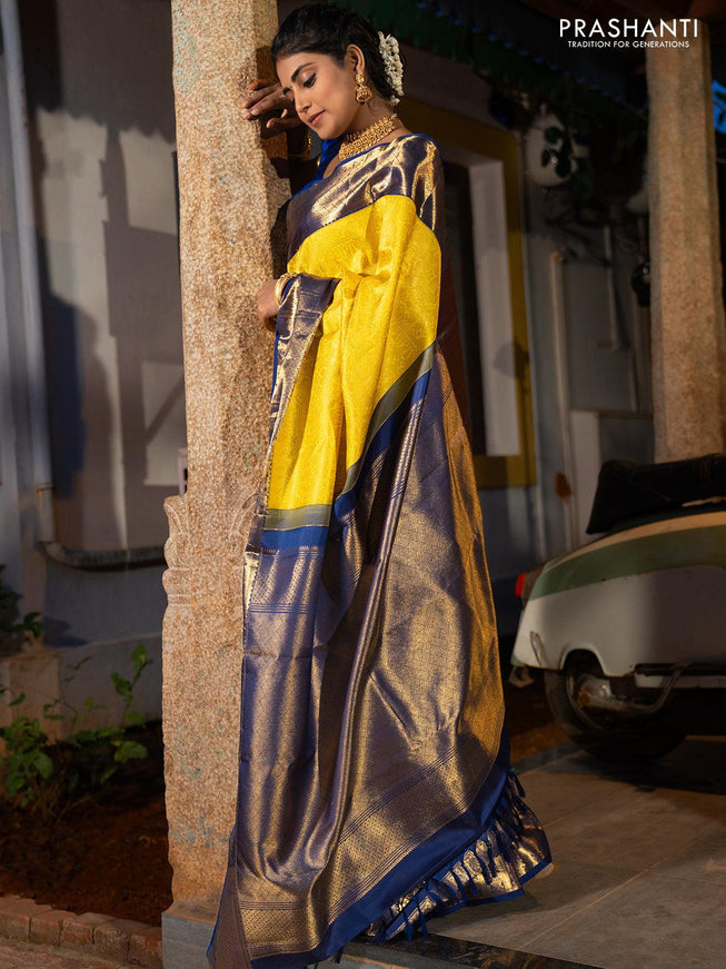 Pure kanjivaram silk saree yellow and blue with allover zari woven vanasingaram brocade weaves and peacock design zari woven korvai border - {{ collection.title }} by Prashanti Sarees