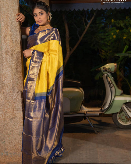 Pure kanjivaram silk saree yellow and blue with allover zari woven vanasingaram brocade weaves and peacock design zari woven korvai border - {{ collection.title }} by Prashanti Sarees
