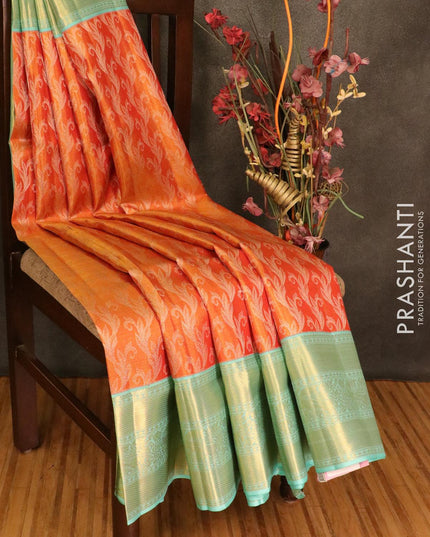 Pure Kanjivaram tissue silk saree dual shade of orangish red and teal with allover silver zari weaves and horse design border - {{ collection.title }} by Prashanti Sarees