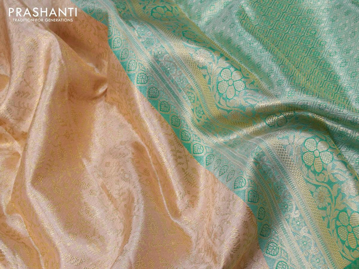 Pure kanjivaram tissue silk saree pastel shade and teal green with allover zari woven brocade weaves and long rich zari woven annam design border - {{ collection.title }} by Prashanti Sarees