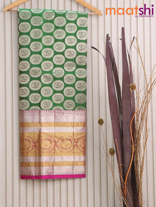Pure silk kids lehenga green and pink with allover annam silver zari butta weaves and long rich annam zari woven border - for 6 to 10 years
