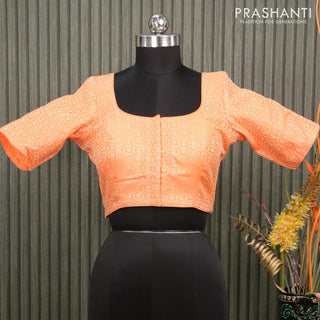 Readymade brocade blouse orange with allover brocade weaves and back knot