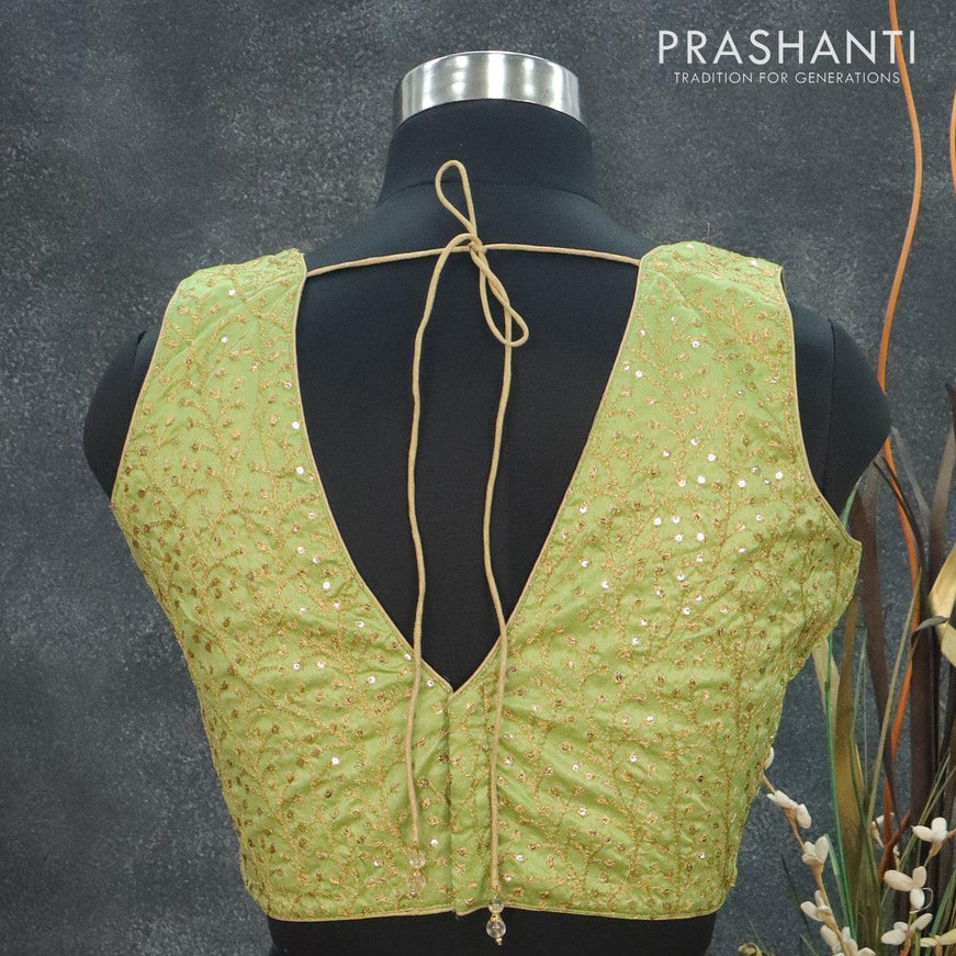 Readymade raw silk sleeveless blouse light green and arri work with V shape neck pattern and back open - {{ collection.title }} by Prashanti Sarees
