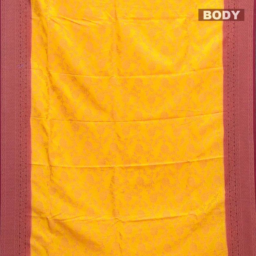 Semi banarasi crepe saree mango yellow and maroon with allover floral zari weaves ans zari woven floral border - {{ collection.title }} by Prashanti Sarees