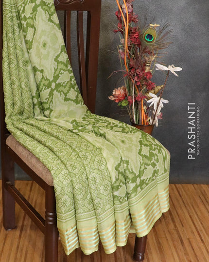 Semi chiffon saree green shade with allover prints and zari woven border - {{ collection.title }} by Prashanti Sarees