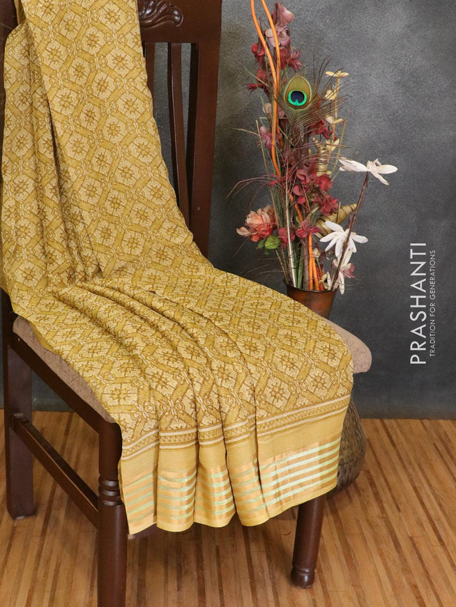 Semi chiffon saree yellow shade with allover prints and zari woven border - {{ collection.title }} by Prashanti Sarees