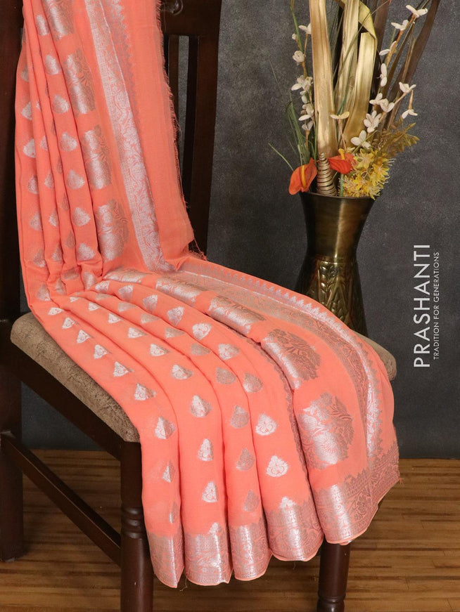 Semi georgette saree peach with allover silver zari woven buttas and silver zari woven floral border - {{ collection.title }} by Prashanti Sarees