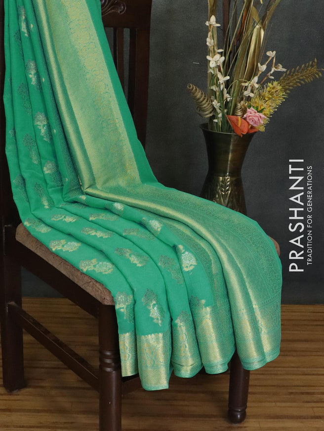 Semi georgette saree teal blue with floral zari woven buttas and floral zari woven border - {{ collection.title }} by Prashanti Sarees