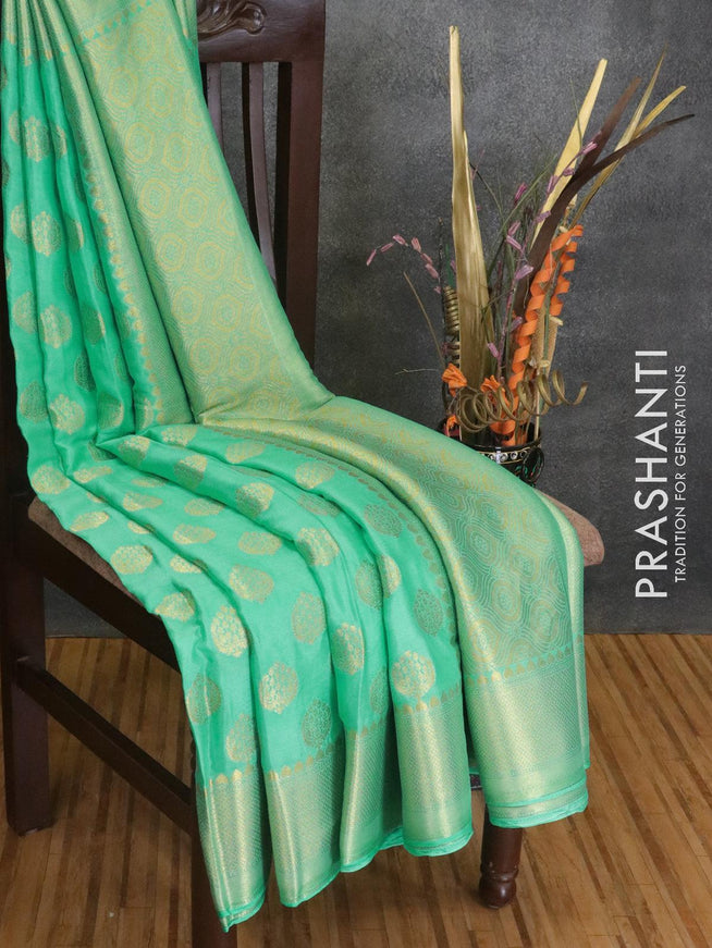 Semi georgette saree teal green shade with allover zari woven buttas and zari woven border - {{ collection.title }} by Prashanti Sarees