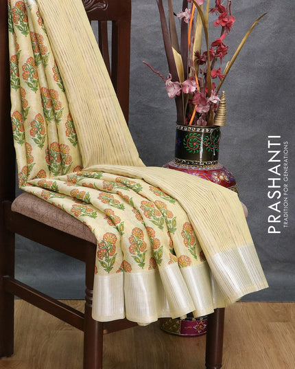 Tissue linen saree cream with allover floral butta prints and silver zari woven border - {{ collection.title }} by Prashanti Sarees