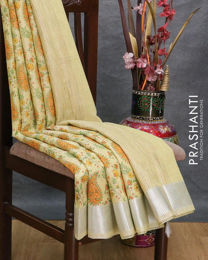 Tissue linen saree pale yellow with allover prints and silver zari woven border - {{ collection.title }} by Prashanti Sarees