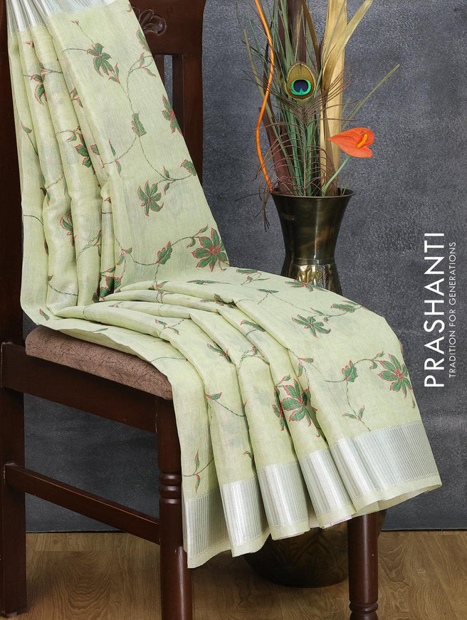 Tissue linen saree pista green with allover floral prints and silver zari woven border - {{ collection.title }} by Prashanti Sarees